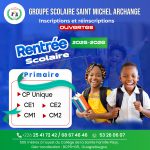 cute pupils running and smiling at camera in hallway at the elementary school